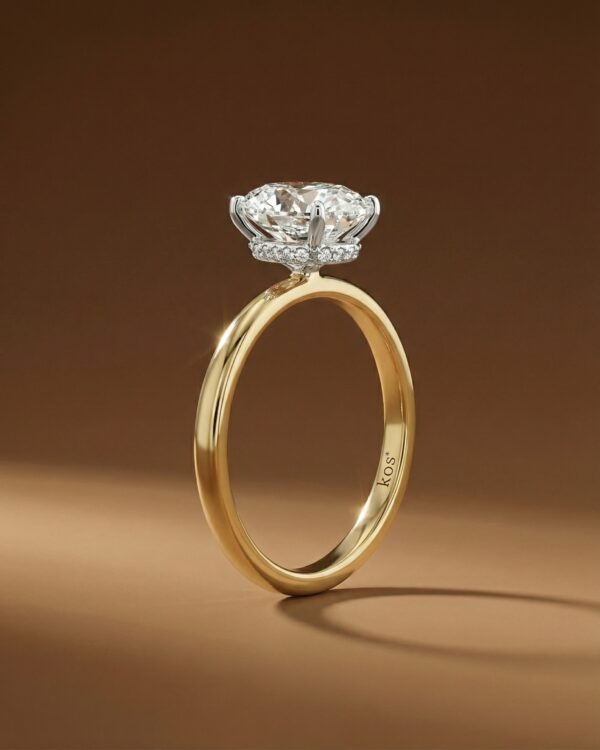 แหวนเพชรรูปไข่ ตัวเรือนสีทอง กระเปาะเพชรสีเงิน จากแบรนด์ kos