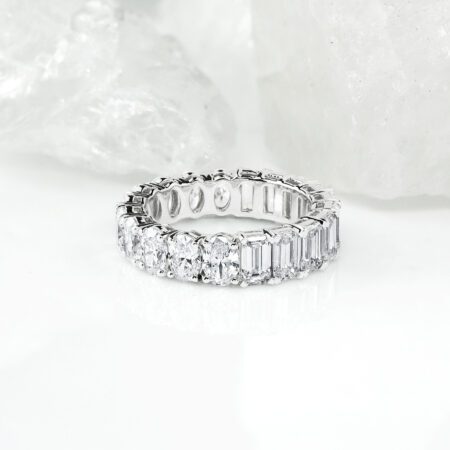 Eternity ring with half “Emerald” and half “Oval” diamond