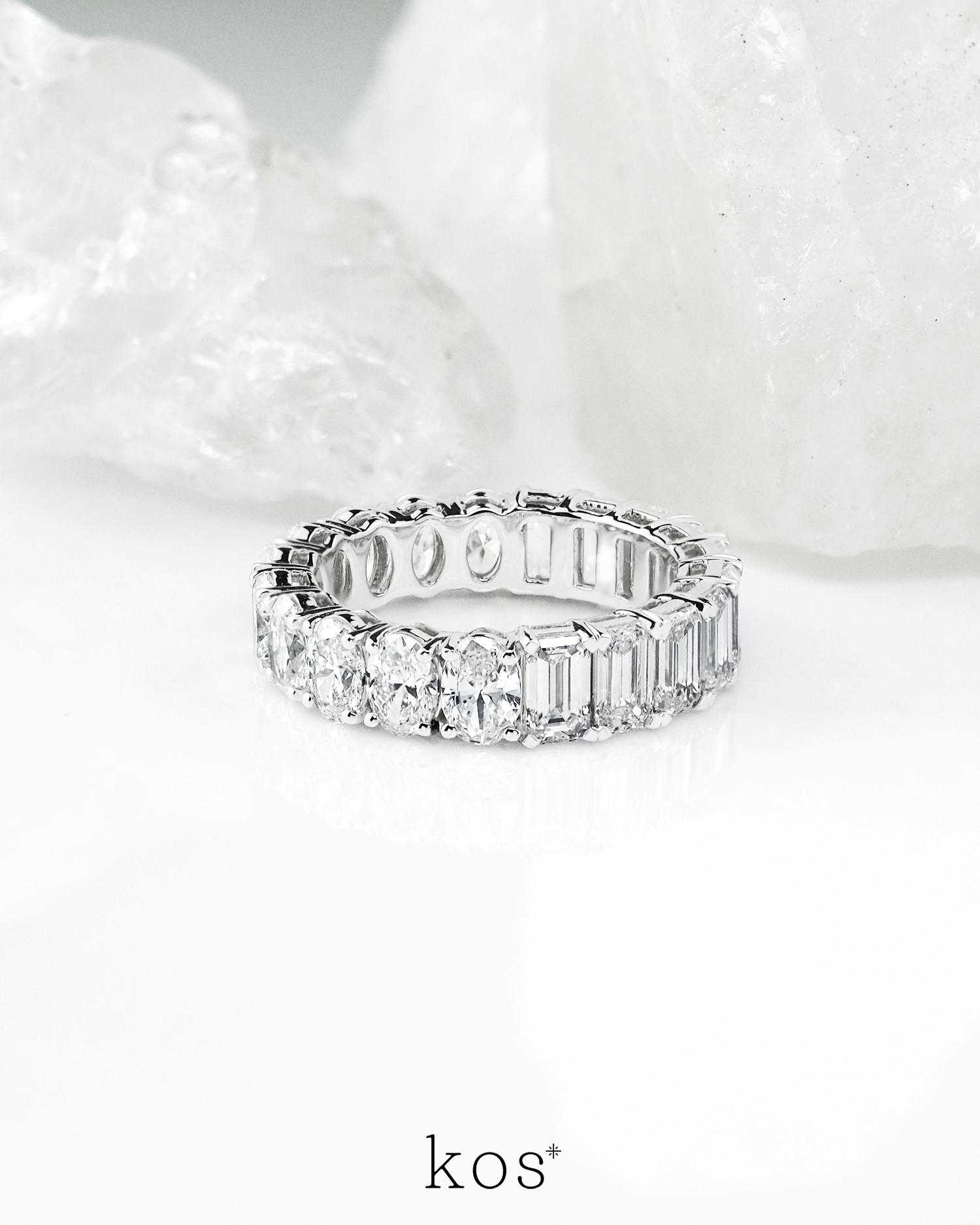 Eternity ring with half “Emerald” and half “Oval” diamond