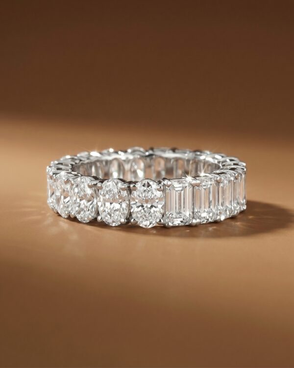 Eternity ring with half “Emerald” and half “Oval” diamond