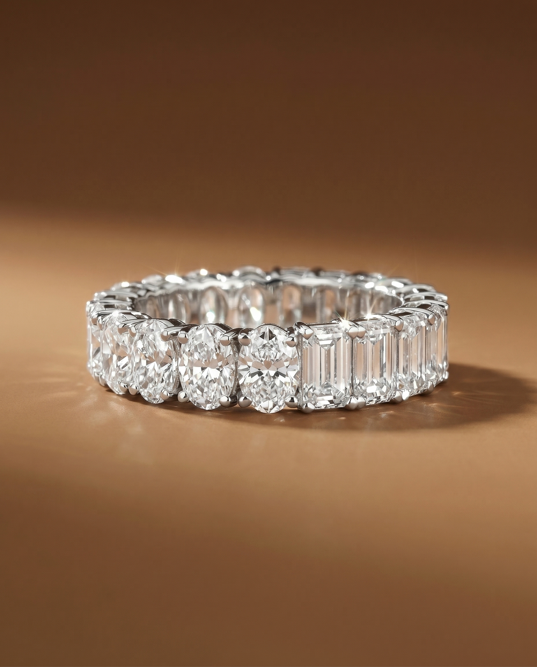 Eternity ring with half “Emerald” and half “Oval” diamond
