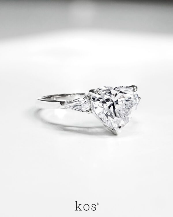 The Heart Ring with Pear Step Cut Side Diamonds