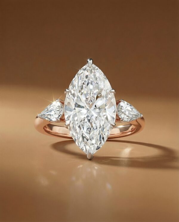 แหวนเพชร Marquise Cut เพชรข้างเป็น Pear Step Cut Diamond