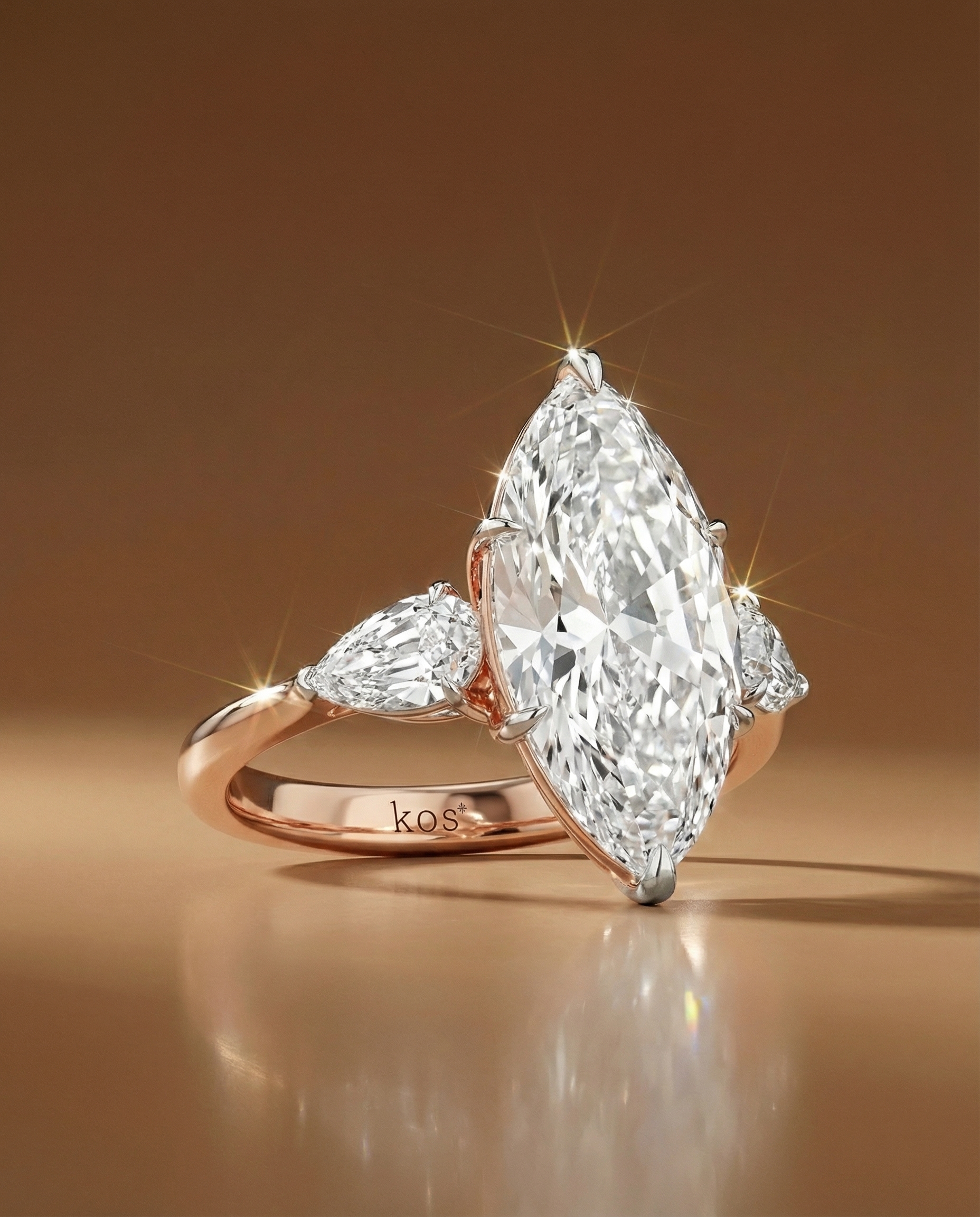 แหวนเพชร Marquise Cut เพชรข้างเป็น Pear Step Cut Diamond