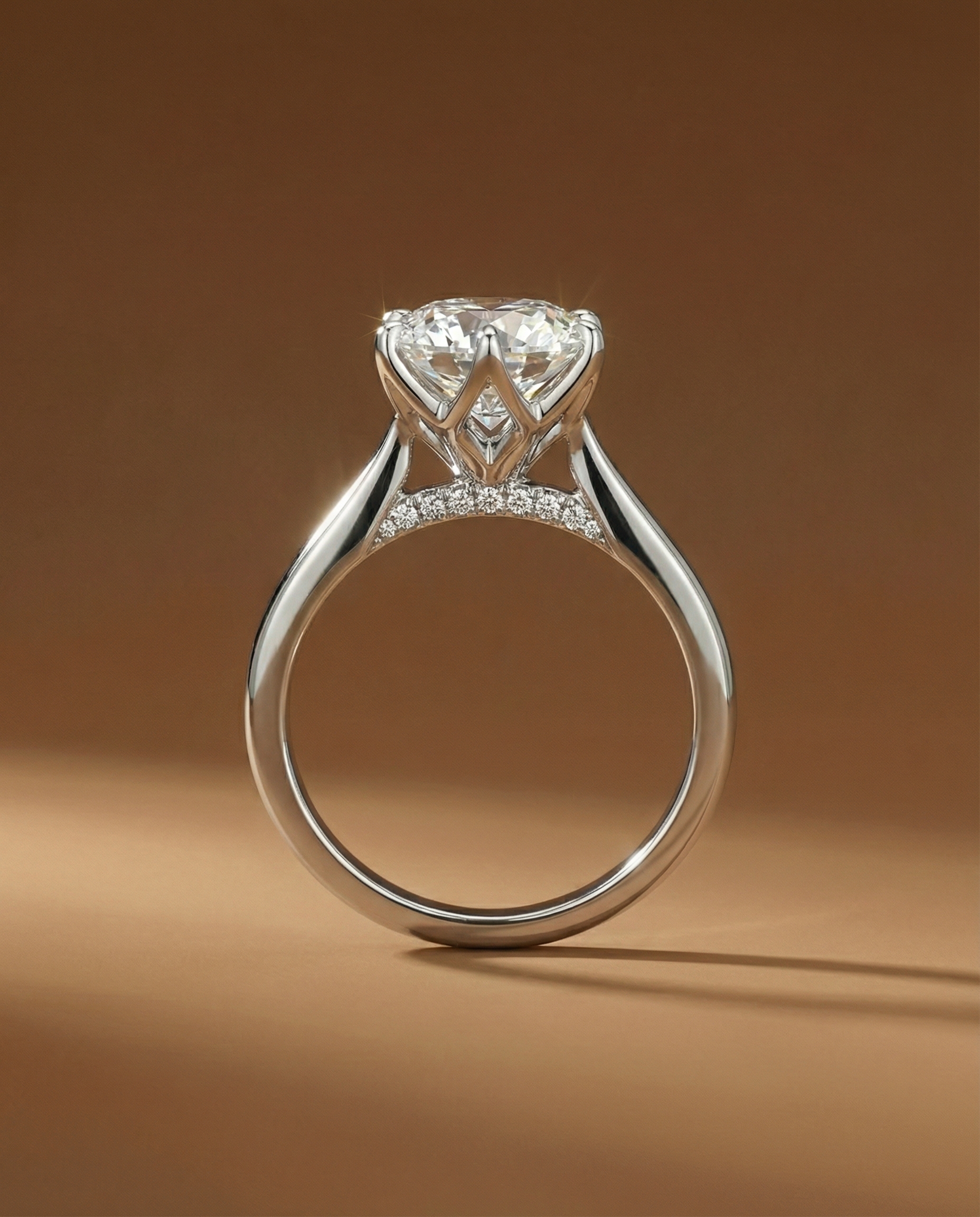 แหวนเพชรชูเม็ดเดี่ยวทรงกลม ดีไซน์ประดับเพชรที่สะพานแหวน